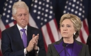 美媒：克林顿夫妇“投降”